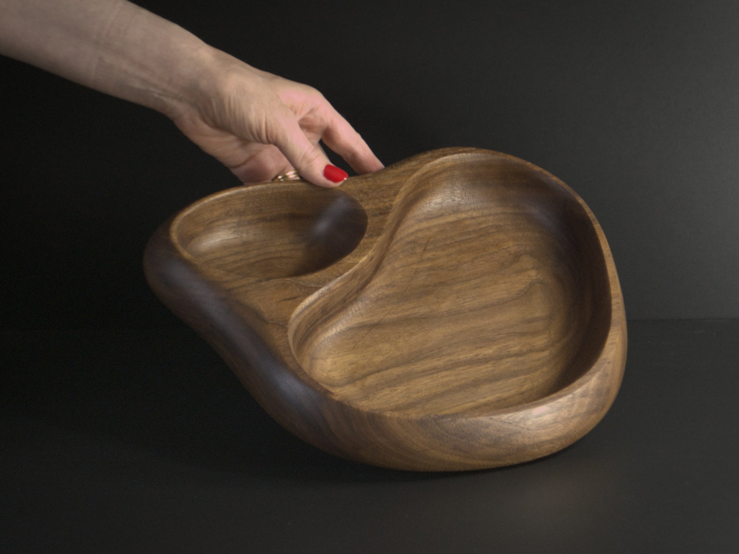 Large double wooden tray being held