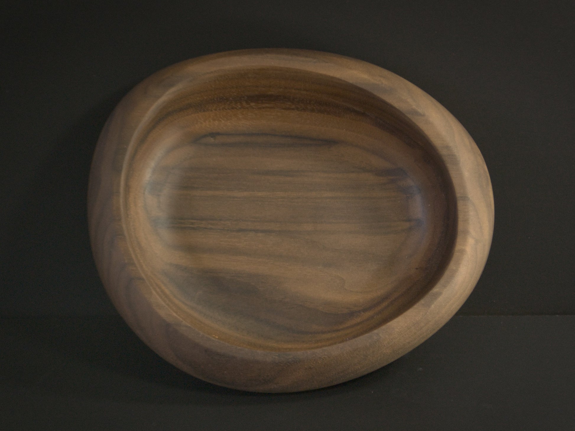 Circular wooden bowl top view