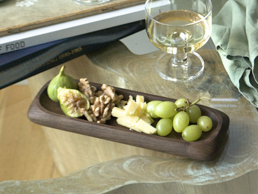 Nibble board holding an array of snacks