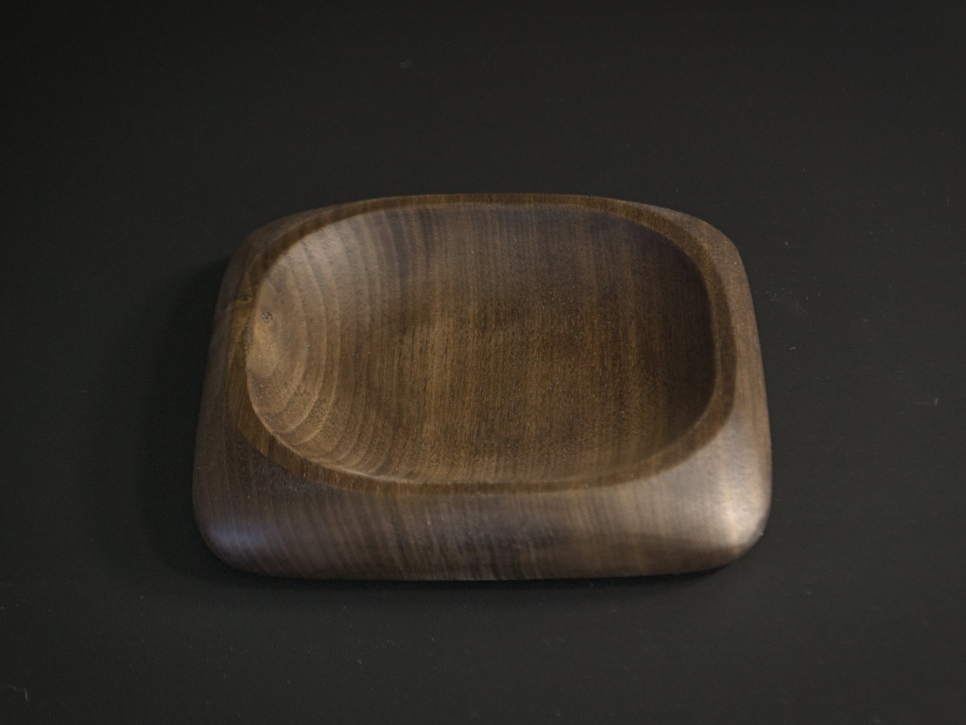 Small square wooden tray with rounded edges