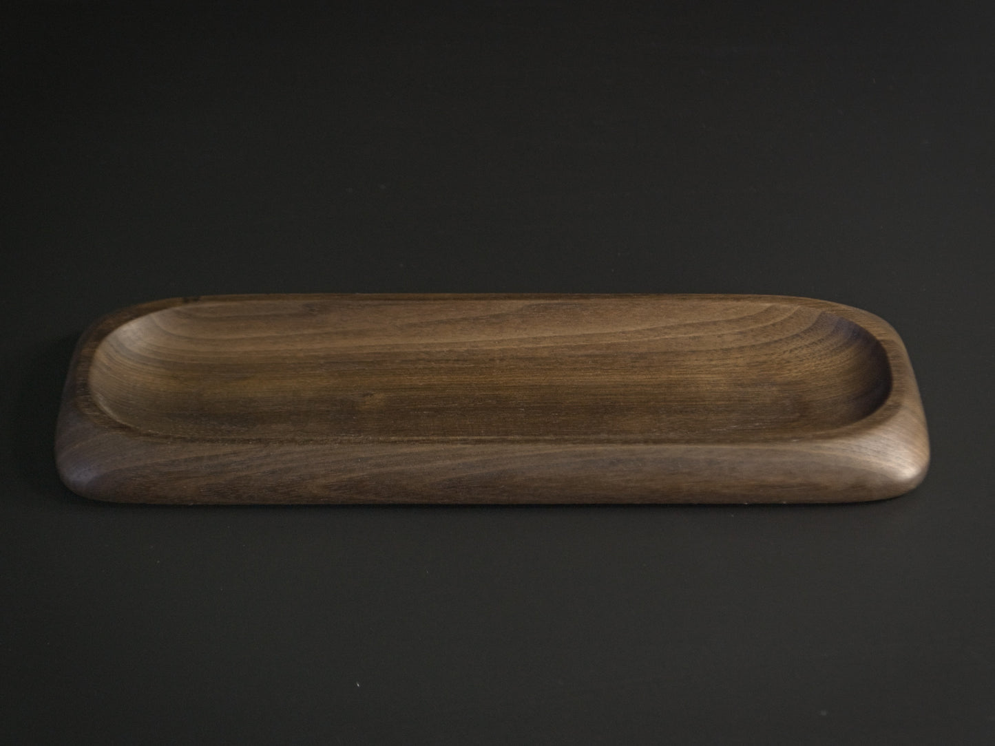 Long thin wooden tray called Nibble Board