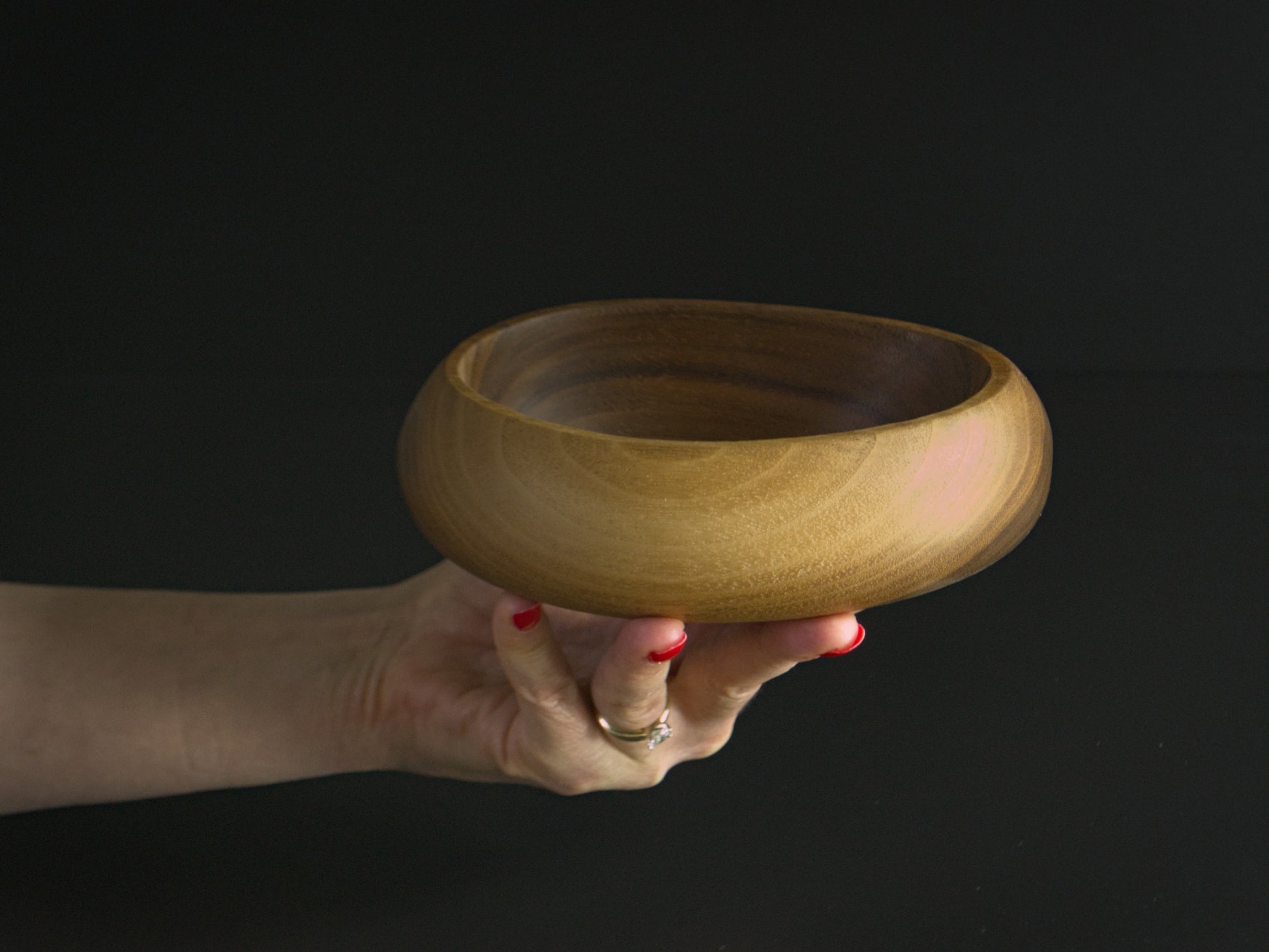 Small single bowl being held